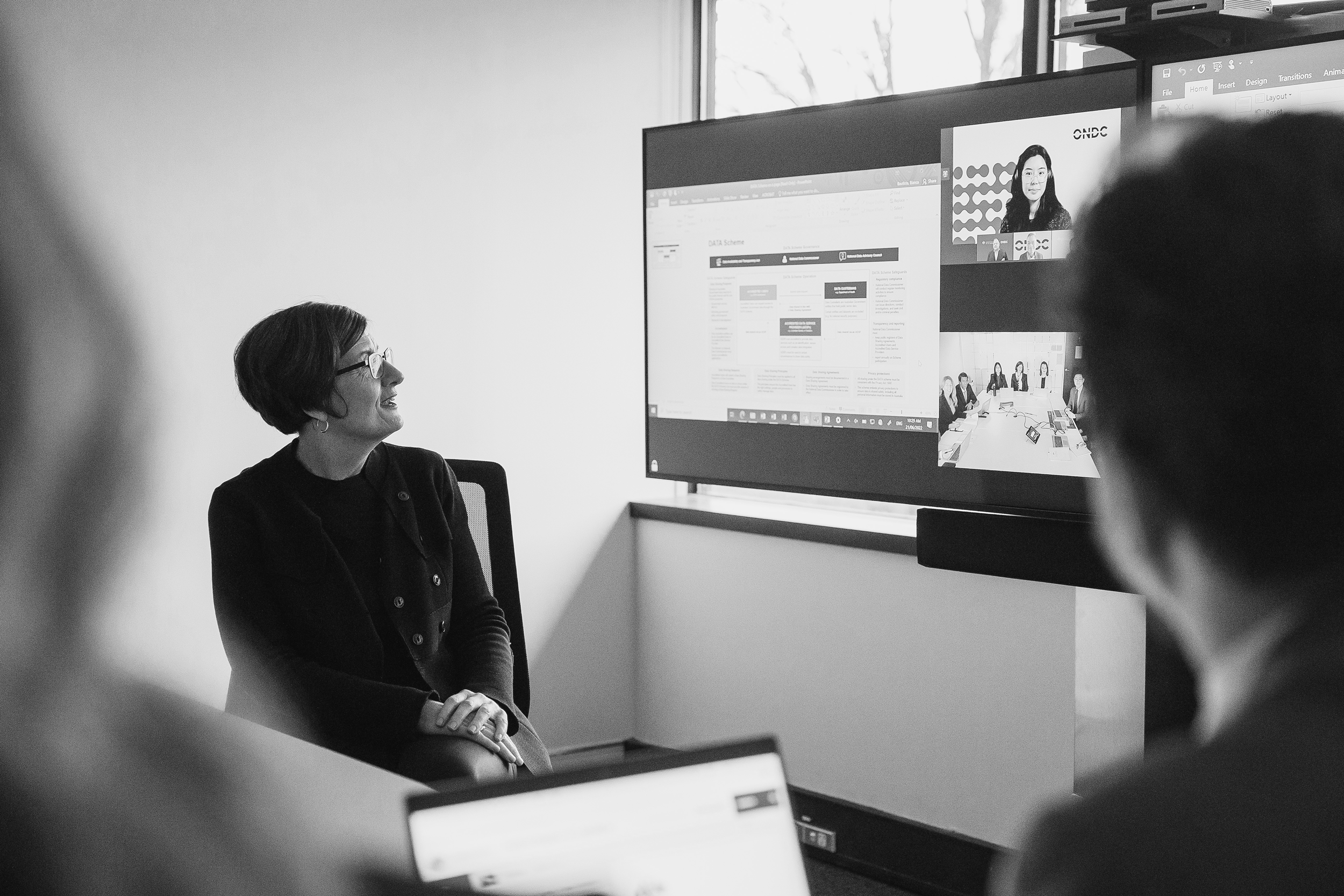 Greyscale image of the staff at the Office of the National Data Commissioner in a hybrid call